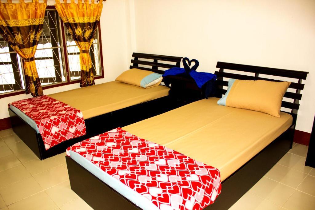 Walkinn Guesthouse 1 Chiang Mai Quarto foto